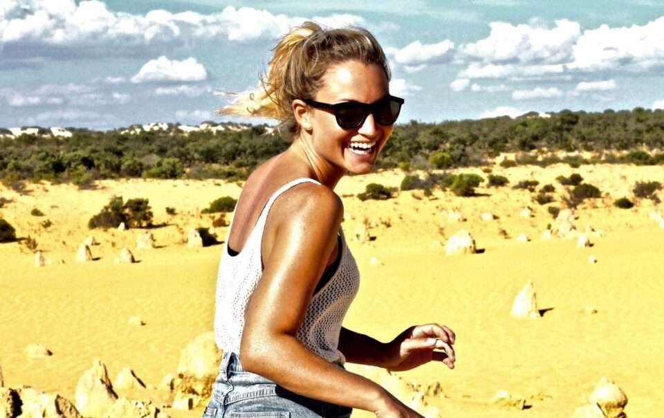 castor oil therapy - woman laughing