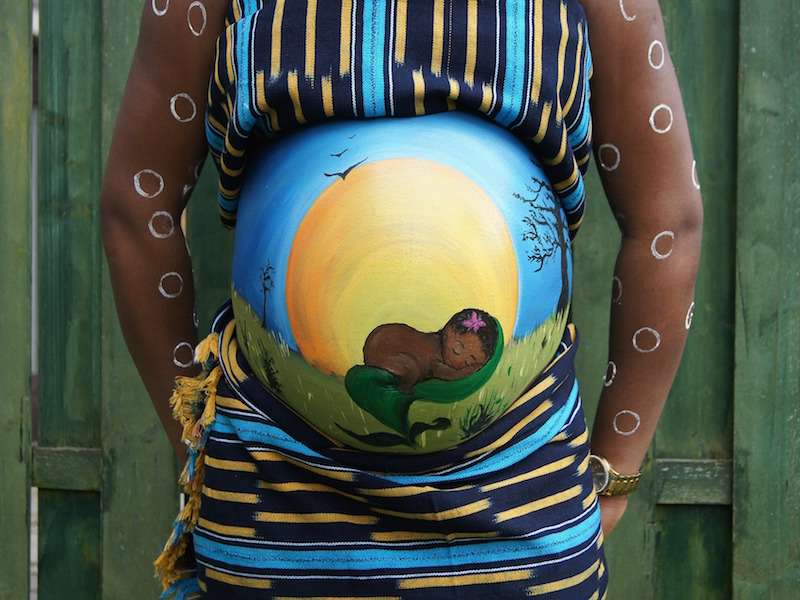 The Worst Pregnancy Myths—image of a painted belly