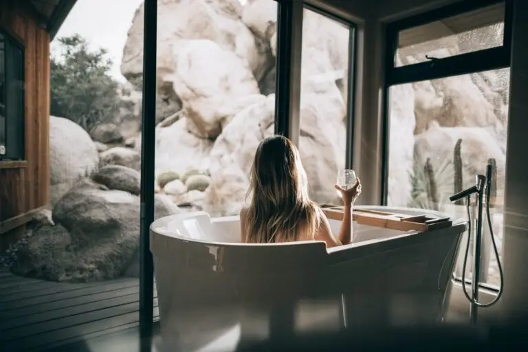 A woman sitting in a bath